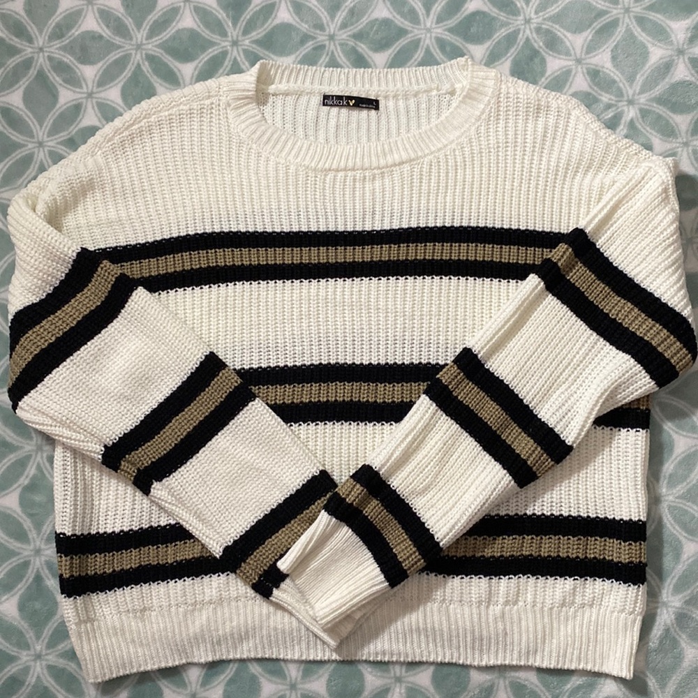 White sweater with black and brown stripes